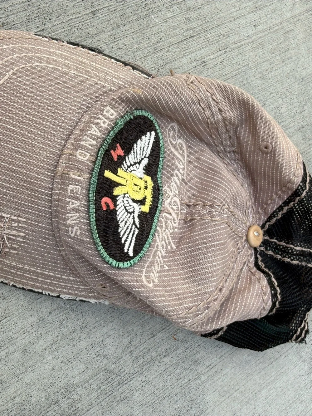 True Religion Beige and Black Trucker Hat with Winged Patch